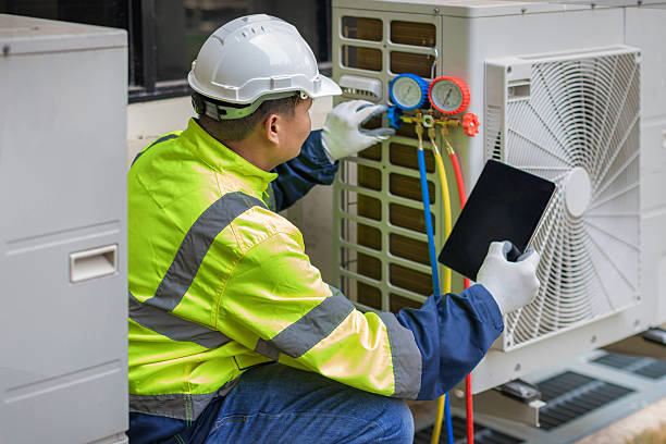 Professional Air Conditioning Repair technician working in Clay, NY